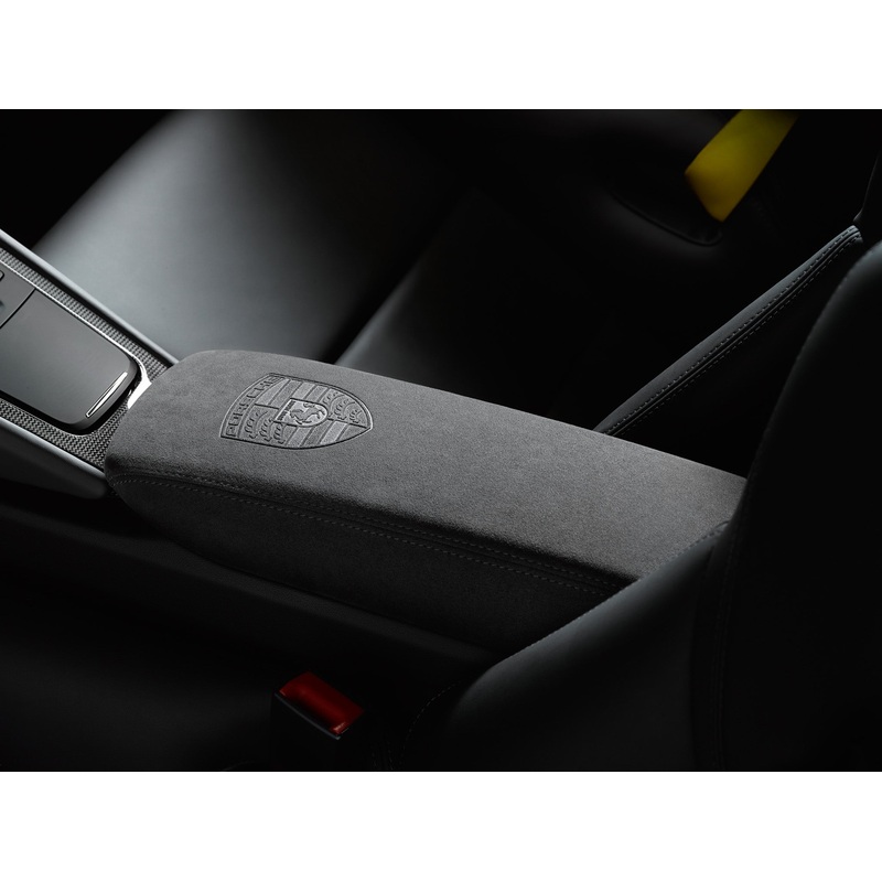 Lid of storage compartment in Alcantara with Porsche Crest